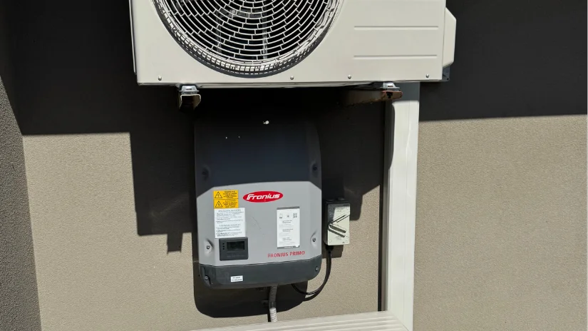 Fronius inverter installed by COYCO under aircon unit outside house