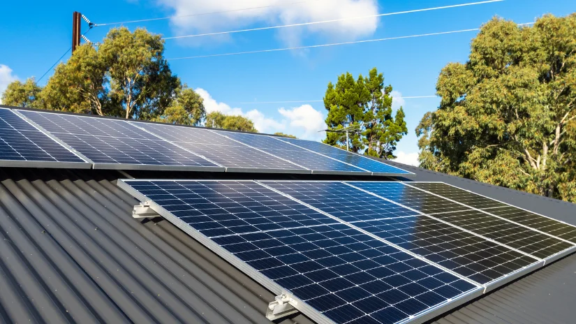 Solar panels on rooftop in WA. Late afternoon sun shining. Solar power is it worth it WA