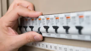 Fingers on Australian Switchboard up close